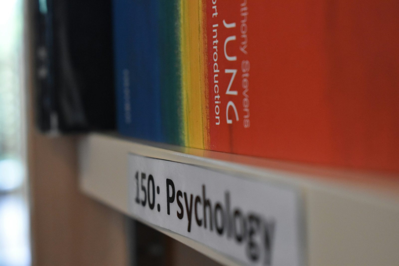a close up of a book shelf with books on it